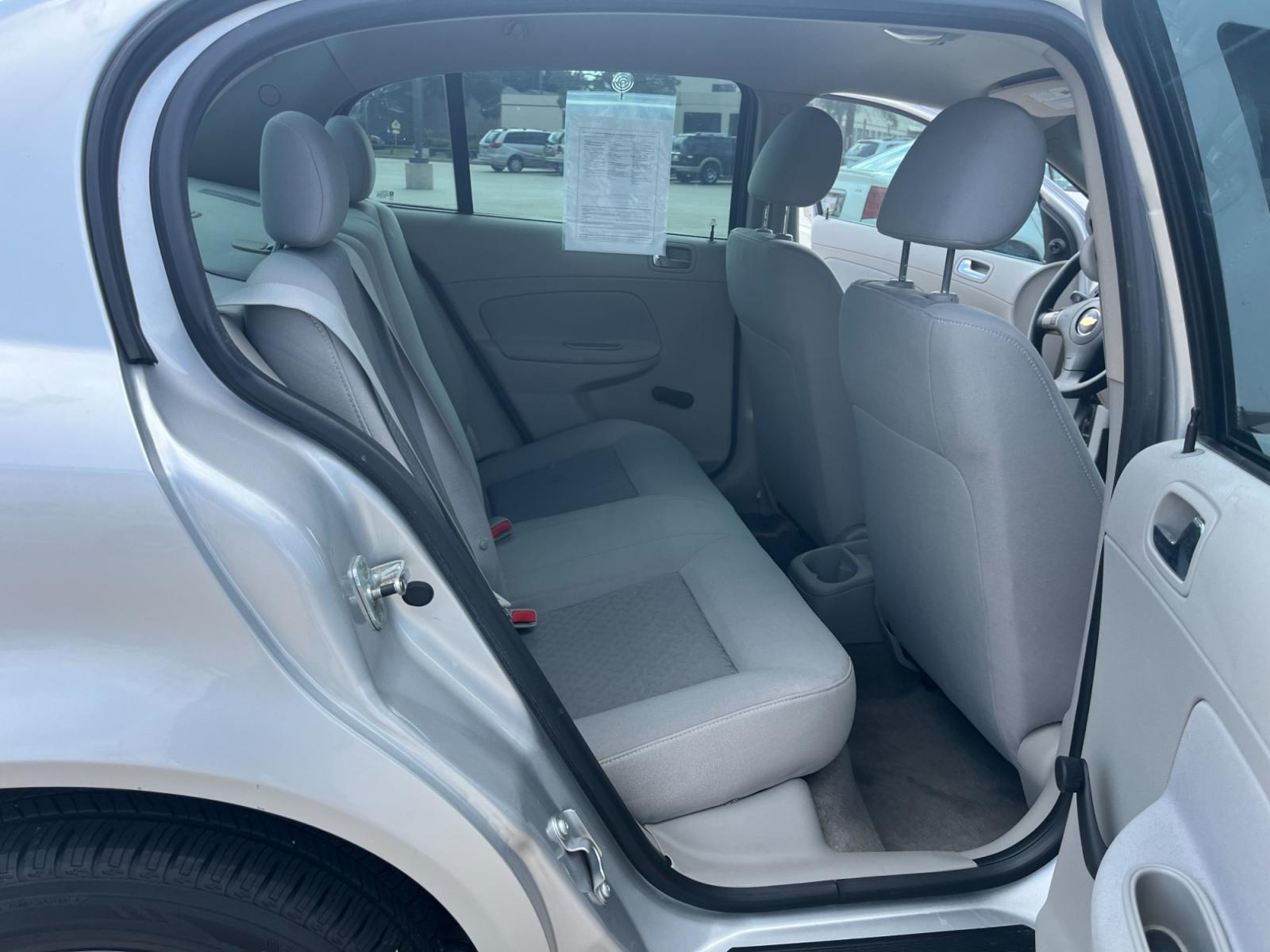 2009 SILVER /black Chevrolet Cobalt LS Sedan (1G1AS58H697) with an 2.2L L4 DOHC 16V engine, 4-Speed Automatic Overdrive transmission, located at 14700 Tomball Parkway 249, Houston, TX, 77086, (281) 444-2200, 29.928619, -95.504074 - Photo #12